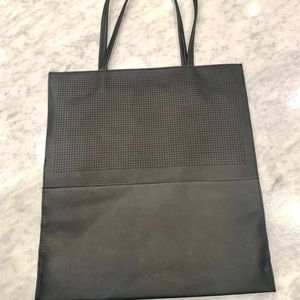 Saks Fifth Avenue tote bag. Faux leather. never used
